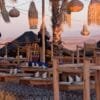 campsite in the Agafay Desert with traditional Moroccan tents under a starry sky