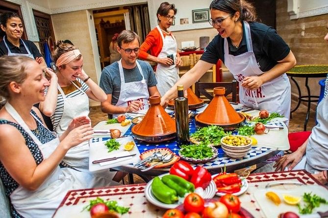 Book a Marrakech and Agafay package with Medina tour, cooking class, camel ride, dinner, live music band, and fire show for a complete local experience.