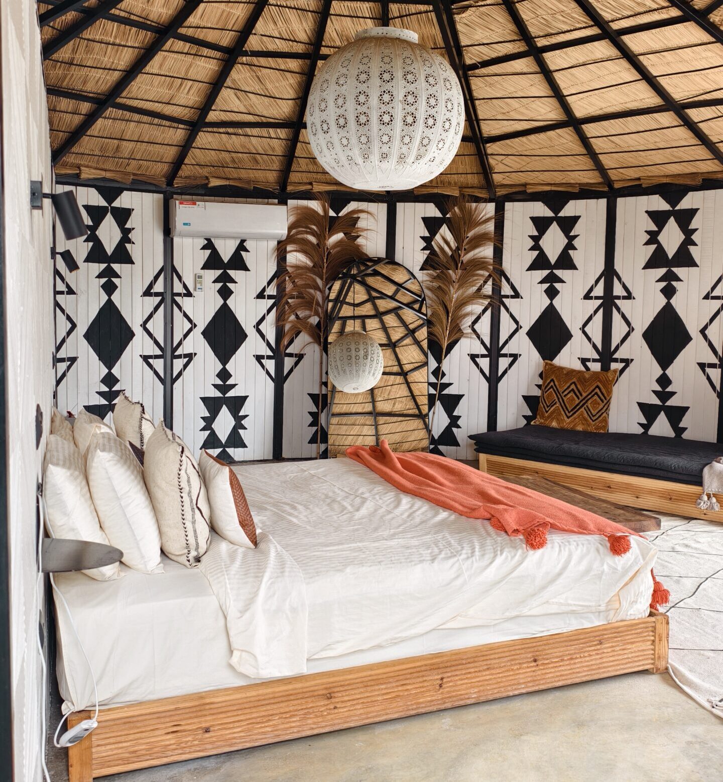 A luxury tent setup in the Moroccan desert showing items from an Agafay desert overnight stay
