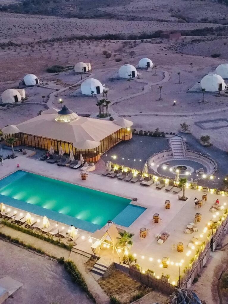 Book Agafay Valley in Agafay Desert with pool access, lunch or dinner, horse riding option, evening entertainment, and optional transport.