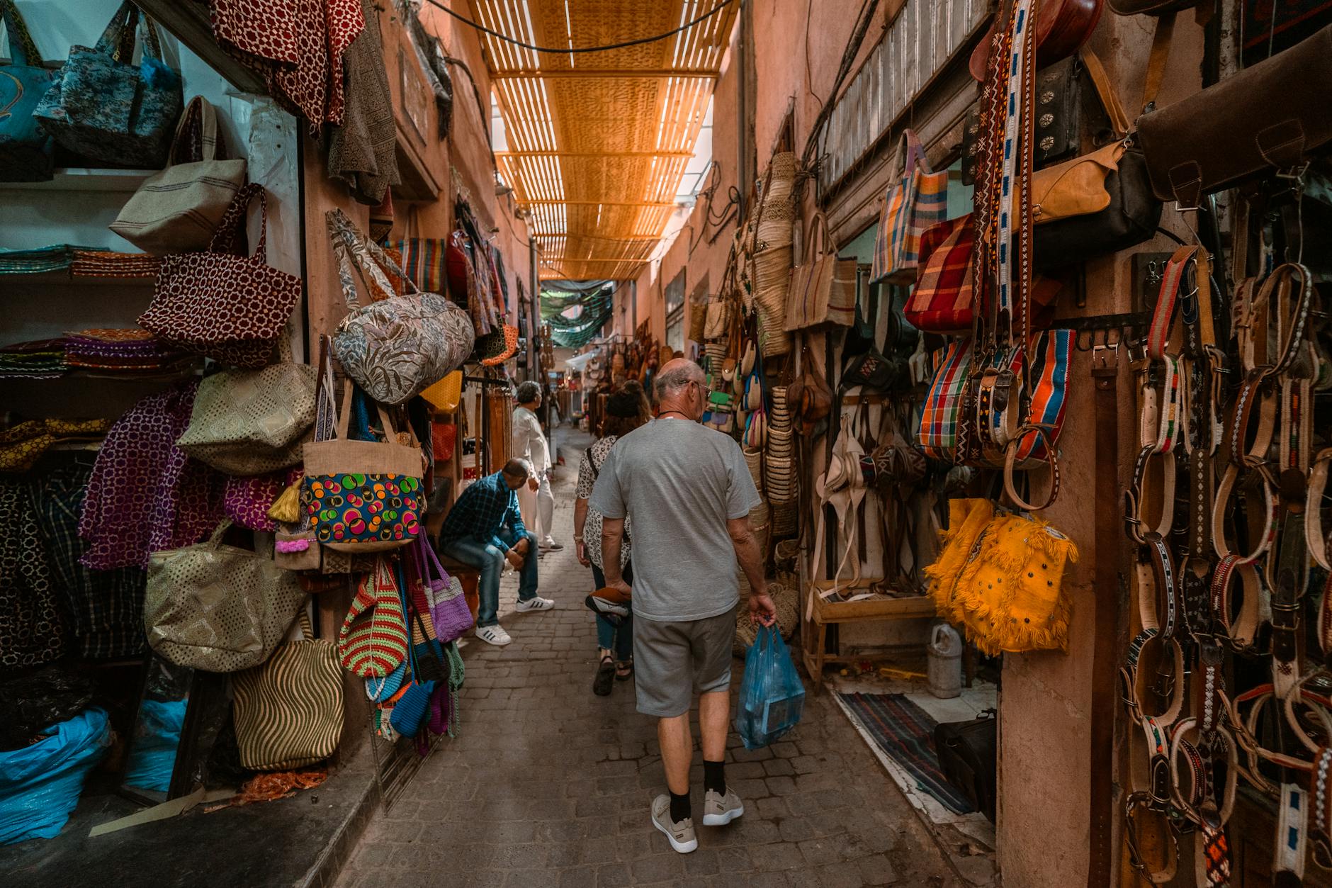 The colorful arched roof and vibrant stalls of Marrakech Souk Semmarine in the Medina