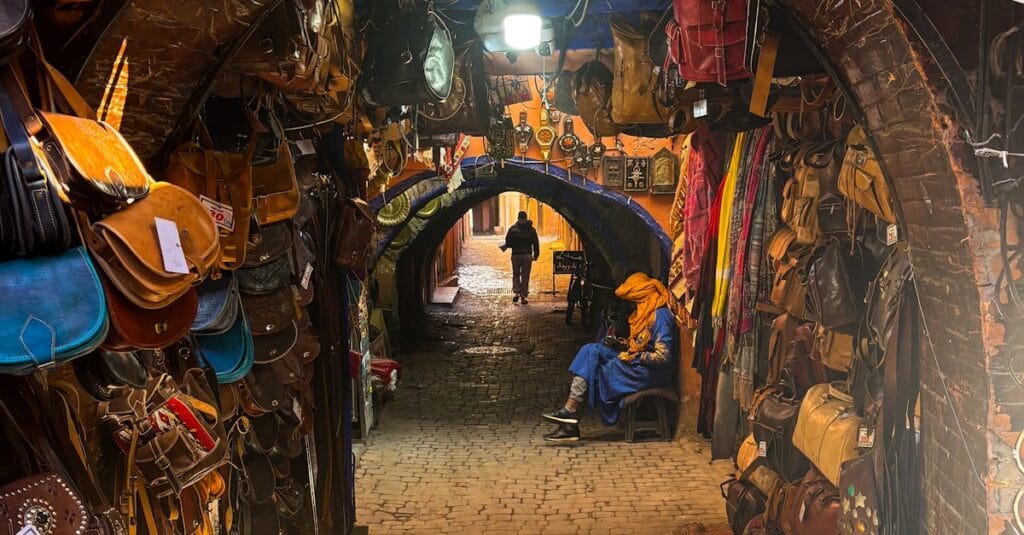 A vibrant display of colorful wool hanging in the Dyers souk marrakech in the heart of the medina.