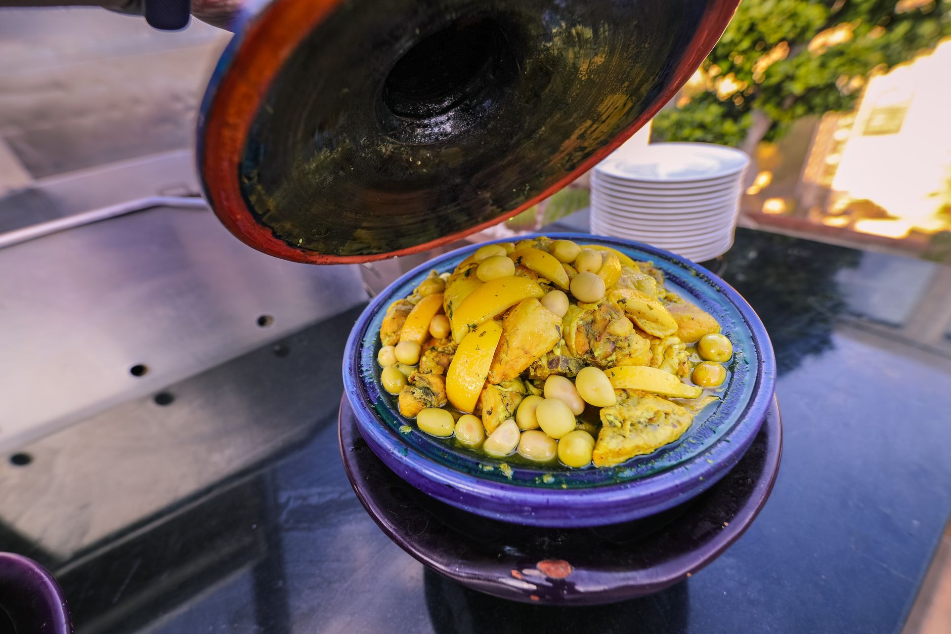 Moroccan tagine preparation during a Marrakech cooking class with Agafay dinner experience